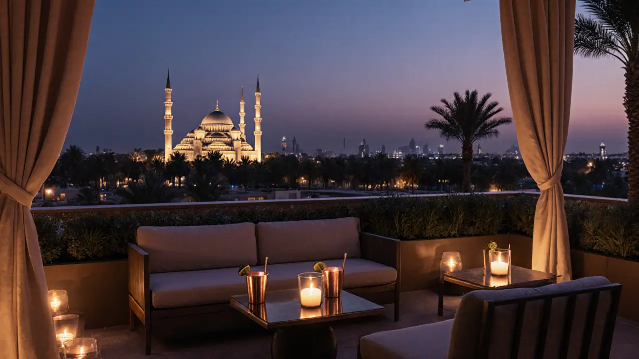 Tranquil rooftop lounge at dusk with mosque lights in background and candlelit cocktails.